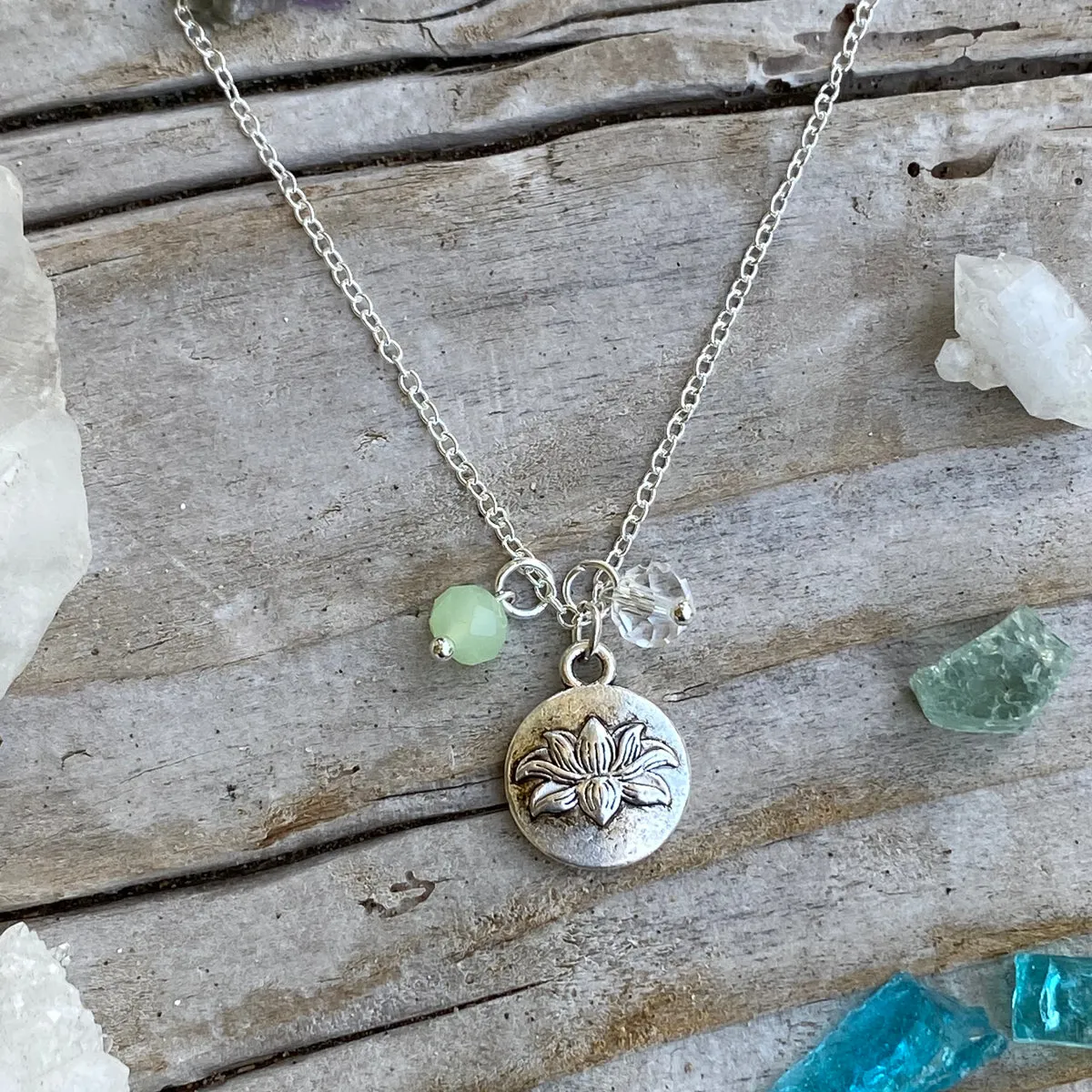 Lotus Charm Necklace with Ocean Green Foam and Clear Crystals for awakening to the spiritual reality of life