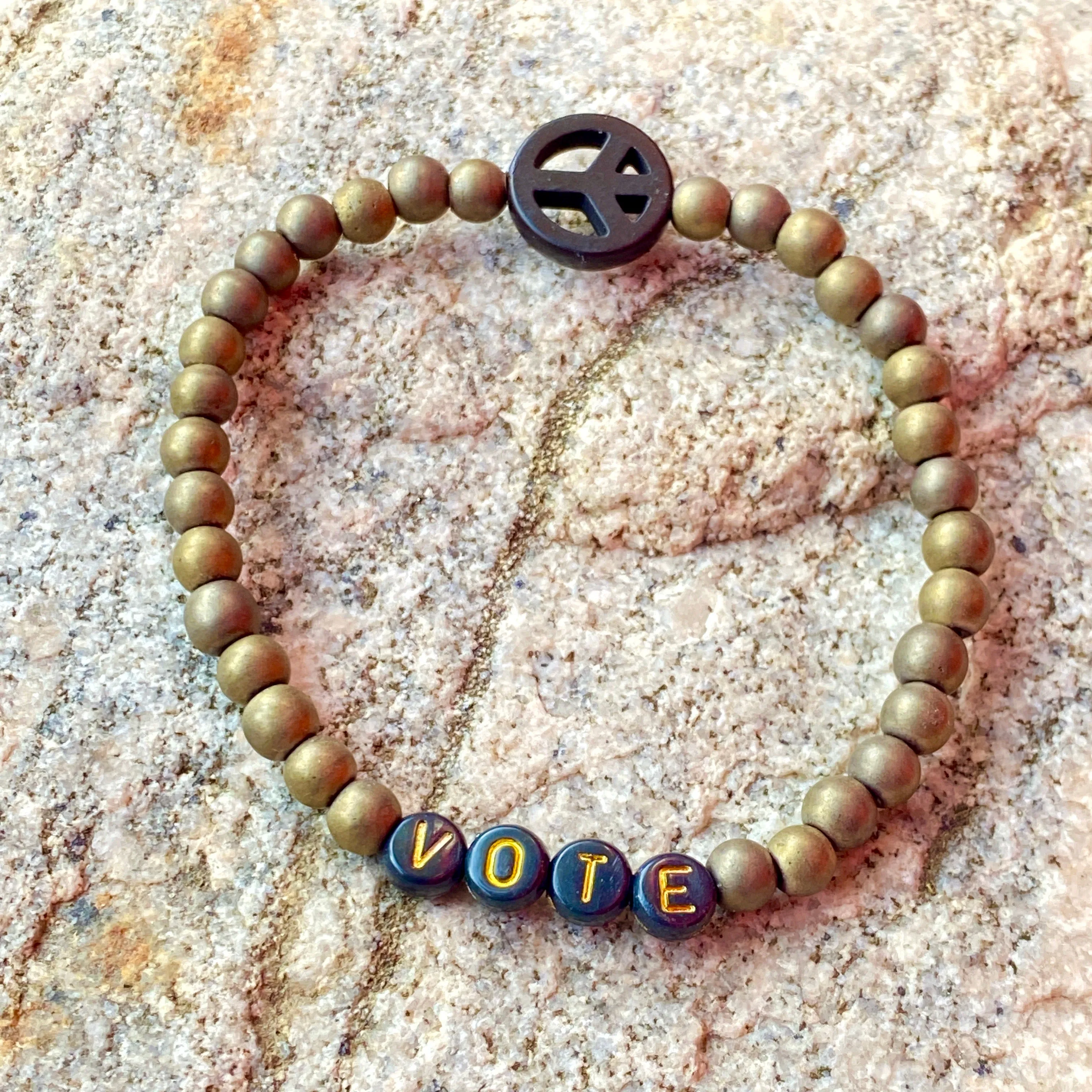 Men’s Matte Gold Hematite “Vote” With Howlite Peace Sign